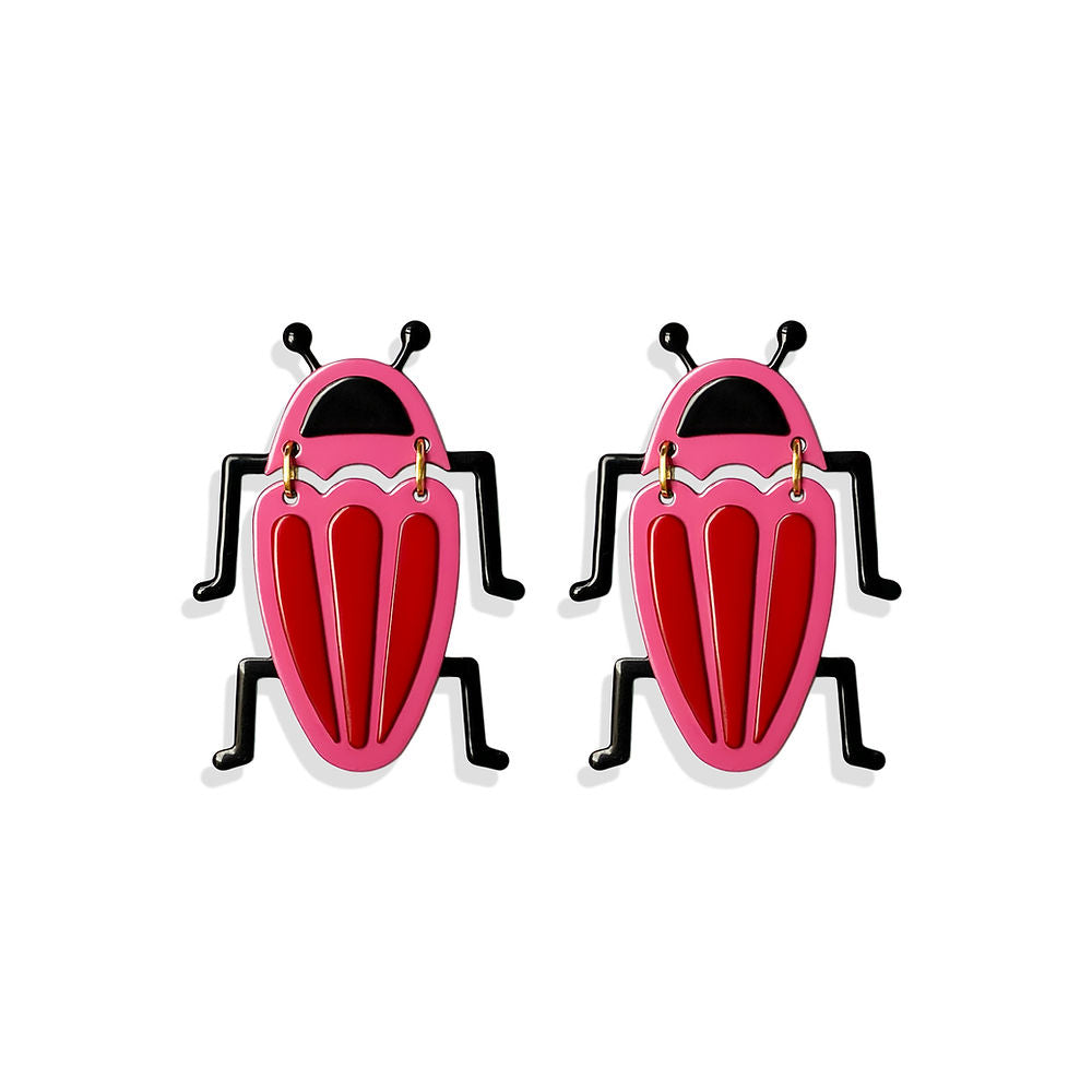 A pair of sculptural earrings shaped like stylized bugs, featuring glossy pink and red bodies with black legs and antennae. Displayed on a white background.
