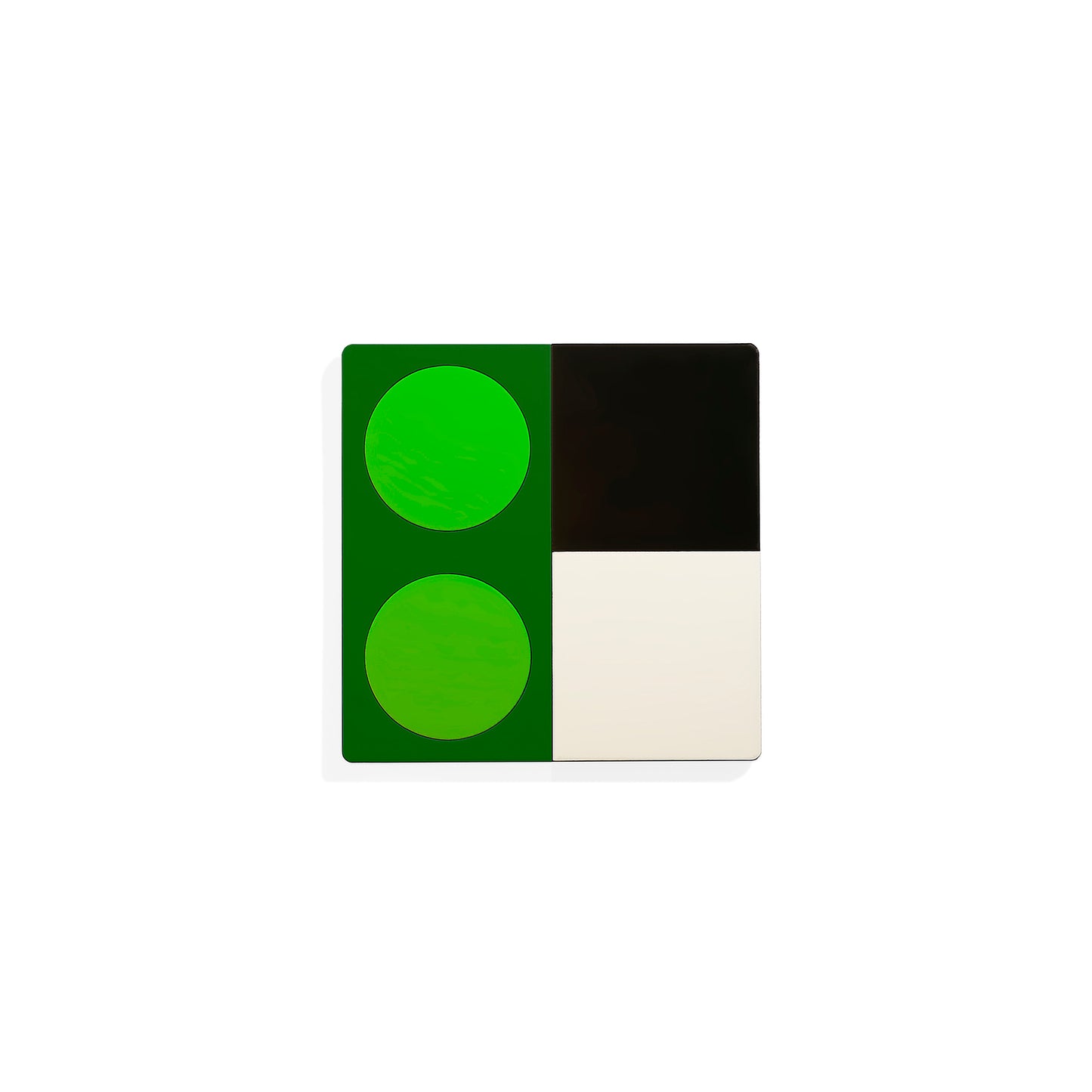 Green square metal coaster with geometric pattern featuring two green circles and color block layout – handcrafted by ISUWA with bold artistic contrast
