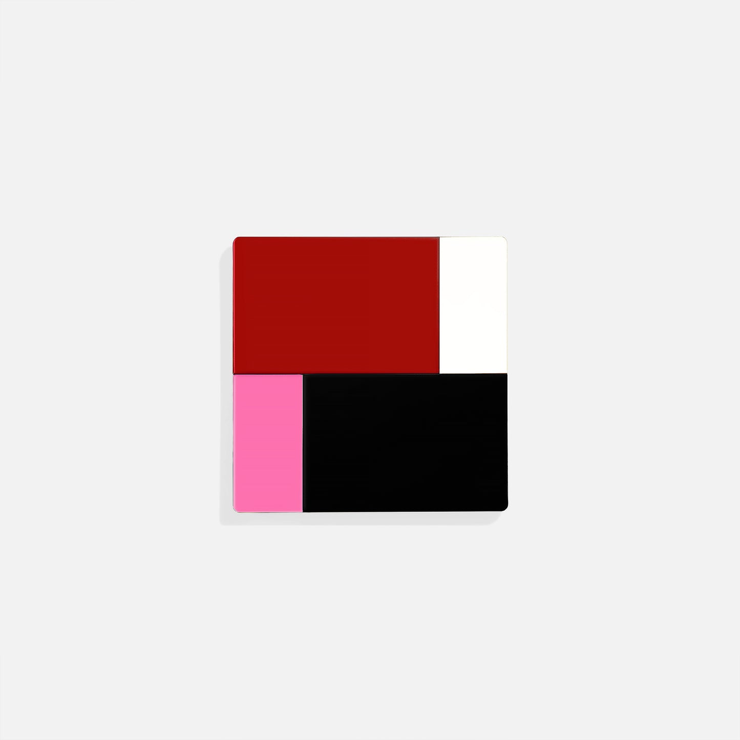 Red square metal coaster with bold pink black and red color blocks – handcrafted by ISUWA for design-forward and artistic tablescapes