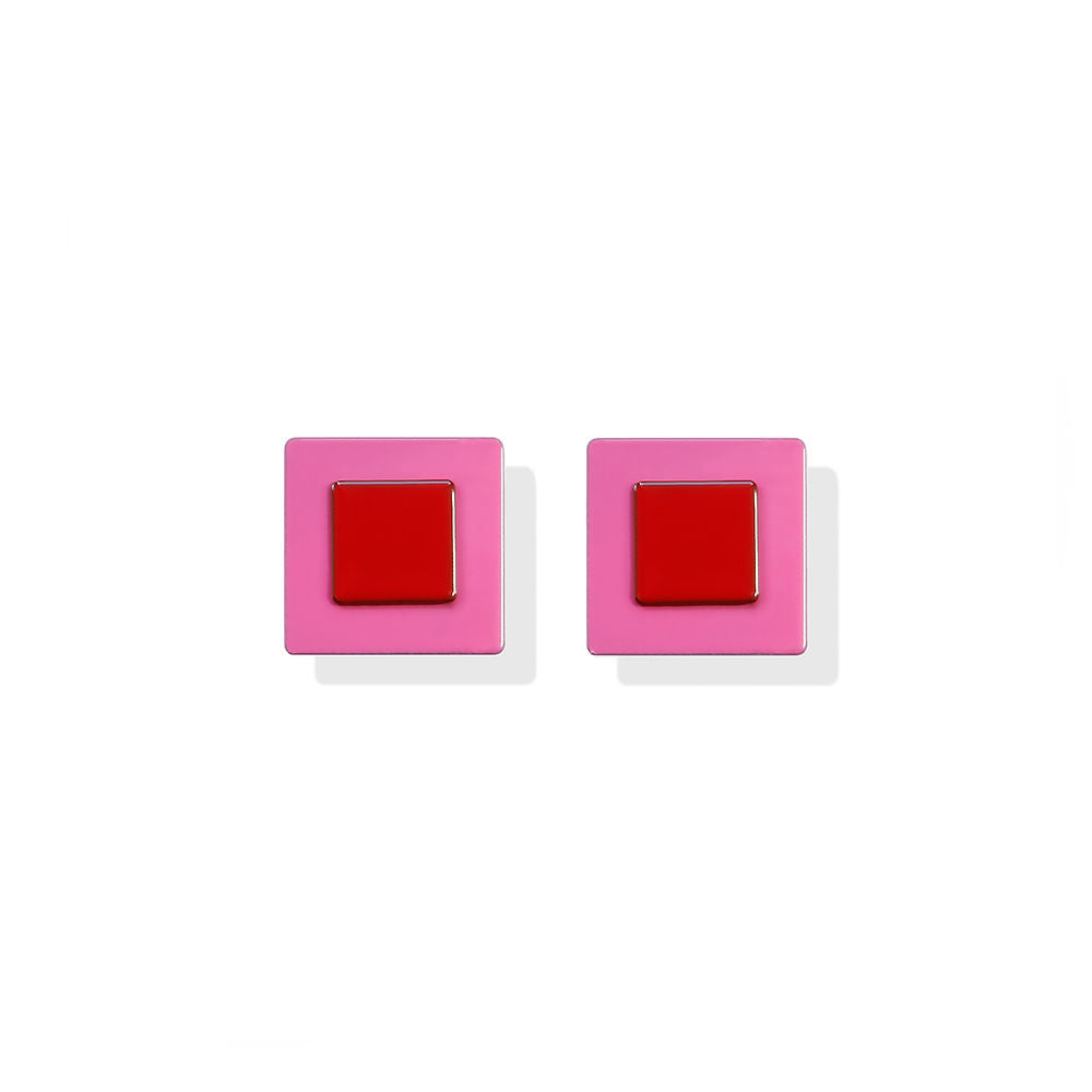 Mini square earrings with a red center framed by pink, designed by ISUWA and photographed on a white background.
