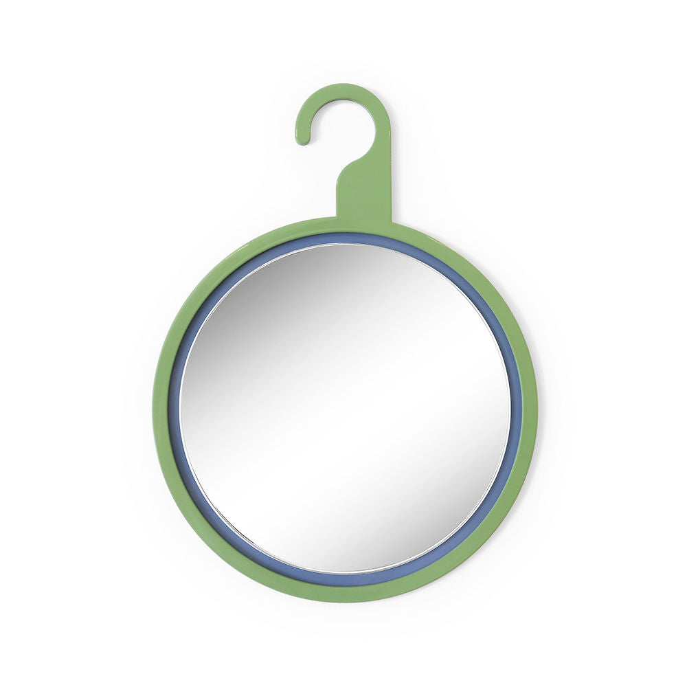 Small round mirror with a soft green frame and hook detail – a playful and modern design statement for the wall.
