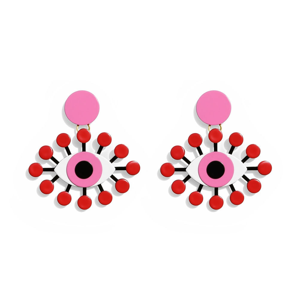 Pair of red and pink evil eye earrings with radiating red circular accents and graphic design, displayed on a white background.
