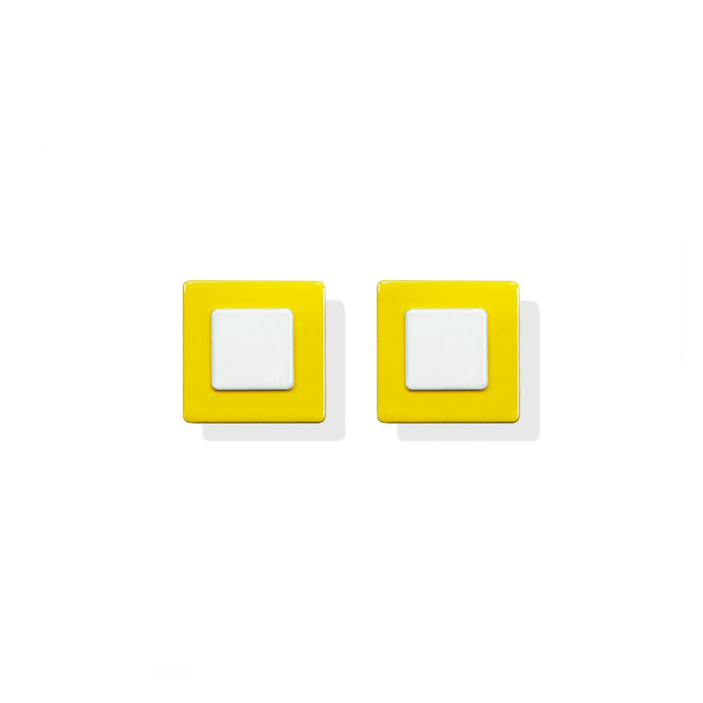 Mini square earrings featuring a white center and yellow frame, designed by ISUWA and photographed on a white background.
