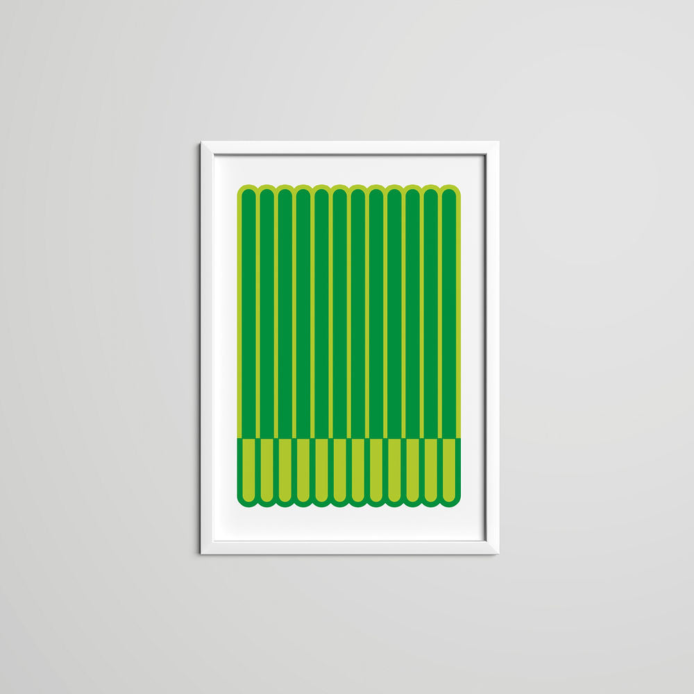 A green striped art print with rounded vertical lines, displayed in a white frame on a light grey wall.
