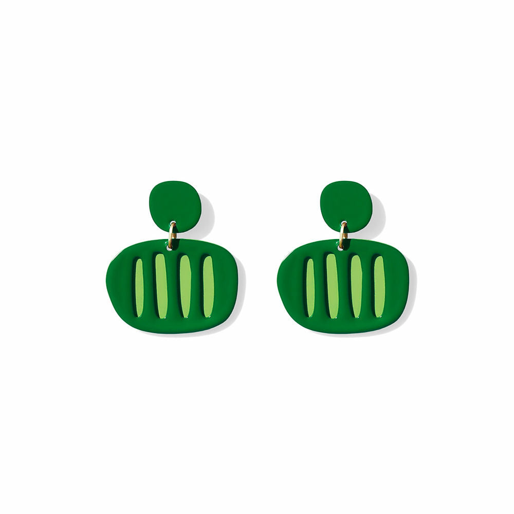 Pair of green earrings with vertical cut-out stripes and round tops, displayed on a white background.