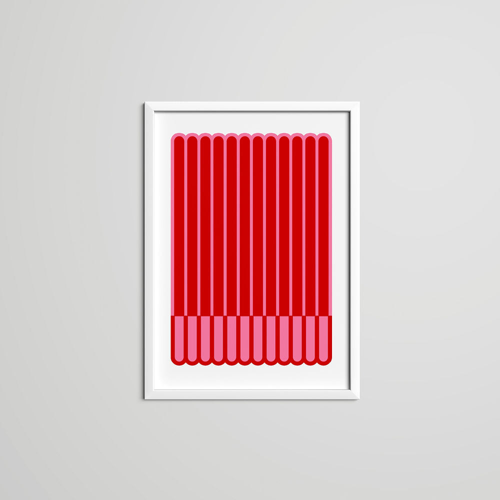 A pink and red striped geometric art print in a white frame, displayed against a light grey wall background.
