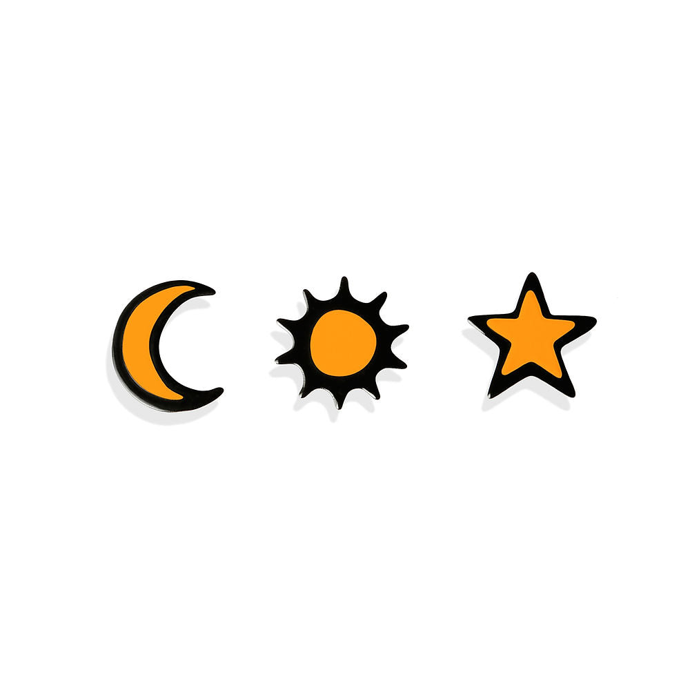 Set of three sculptural earrings in orange and black shaped as a moon, sun and star, designed by ISUWA and photographed on a white background.
