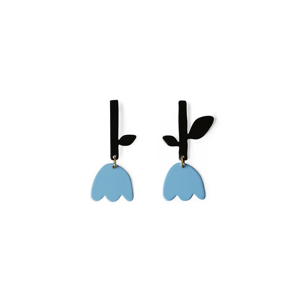 Pair of small tulip-shaped earrings in blue with black stem and leaf design, displayed on a white background.

