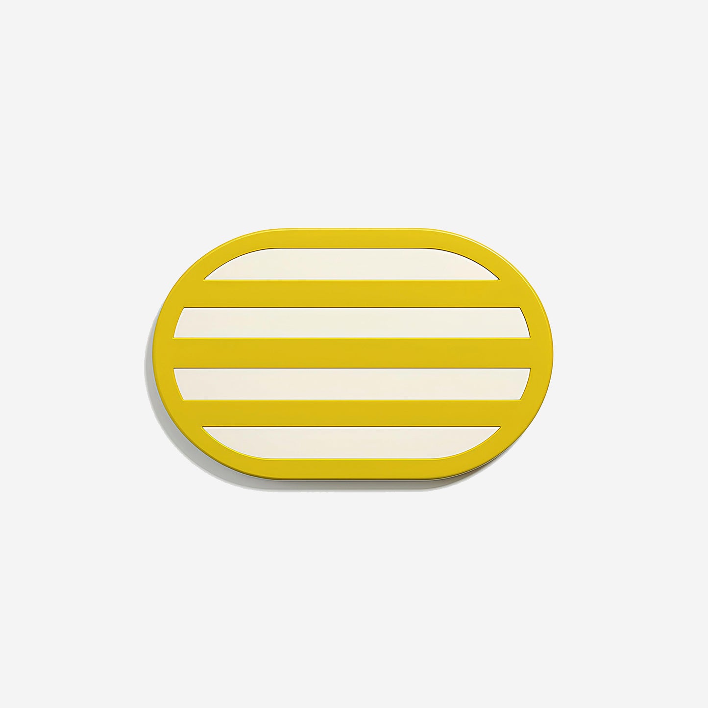 Yellow oval metal coaster with horizontal white stripes, handcrafted from glossy powder-coated metal – minimalist and modern tableware by ISUWA