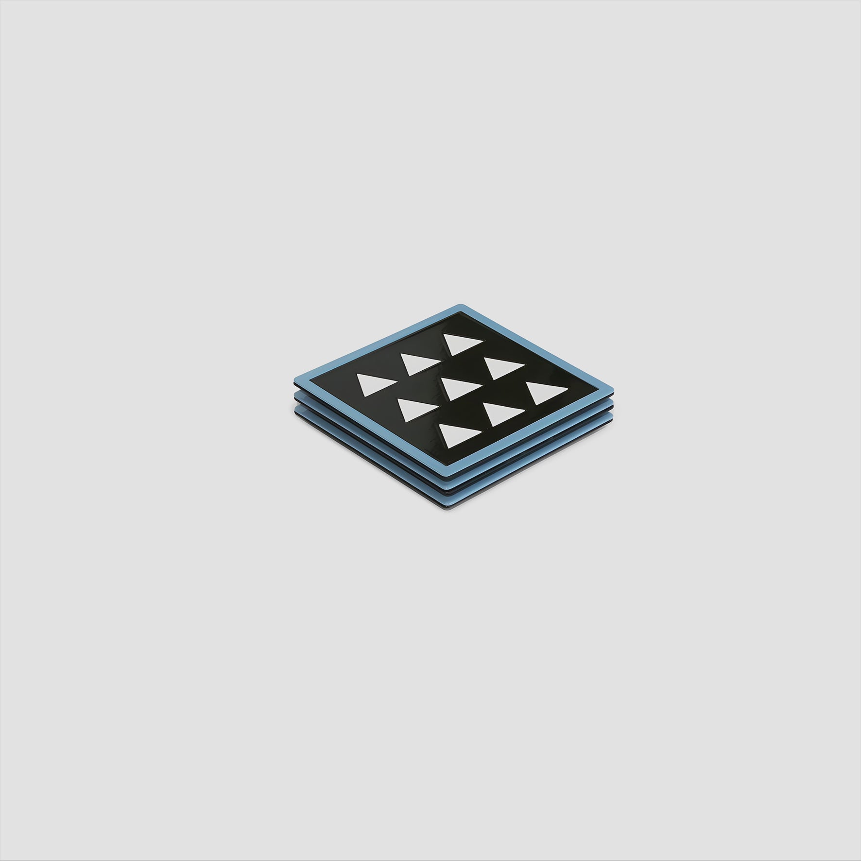 Video showcasing the ISUWA Circle Patterned Coaster — a black metal square coaster with glossy white dots. A cup elegantly moves across the surface, highlighting the glossy finish and modern design.
